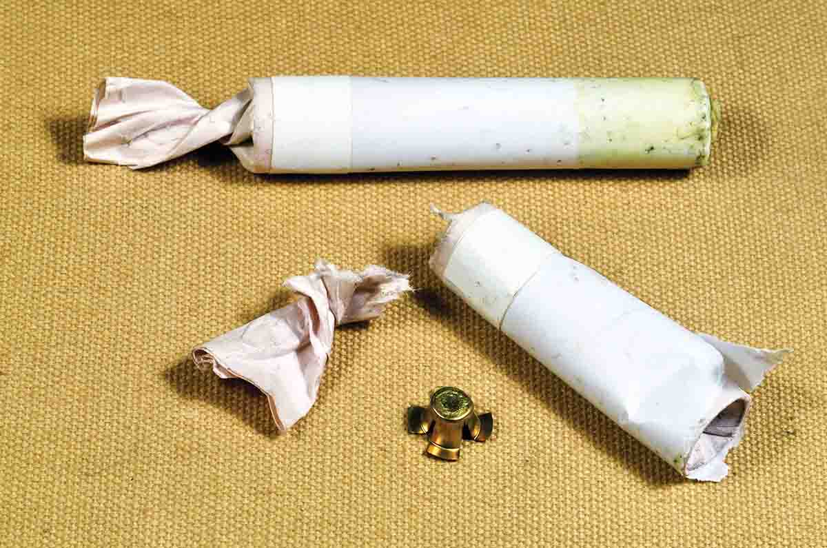 Before and after: The twisted top is torn off the cartridge to allow the powder to be poured down the barrel. When the greased bullet end is placed in the muzzle, the excess paper (including the stiff paper “powder chamber”) easily breaks off to allow the bullet to be seated. An enormous amount of time, effort and field trialing went into perfecting a cartridge that worked every time, regardless of climate.